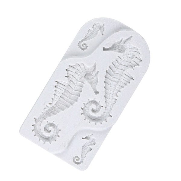 Baltas silikoninis kepimo indas, atlaikantis iki 230 laipsnių su jūrų arkliukais