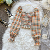 Μοντέρνα γυναικεία μπλούζα με στρογγυλή λαιμόκοψη και φαρδιά μανίκια