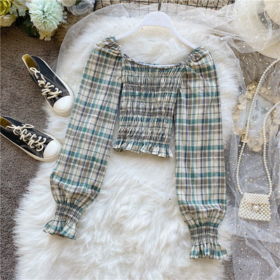 Μοντέρνα γυναικεία μπλούζα με στρογγυλή λαιμόκοψη και φαρδιά μανίκια