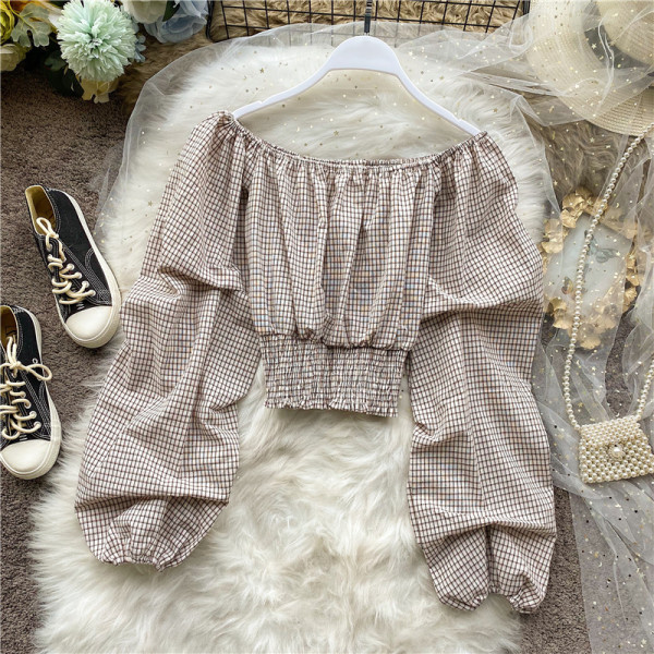 Modern női blúz kerek nyakkivágással és széles ujjakkal