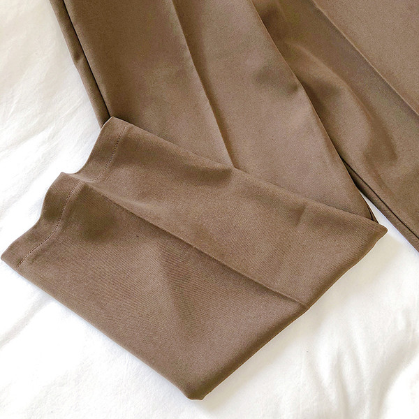 Stiilsed kõrge vöökohaga naiste püksid kolmes värvitoonis