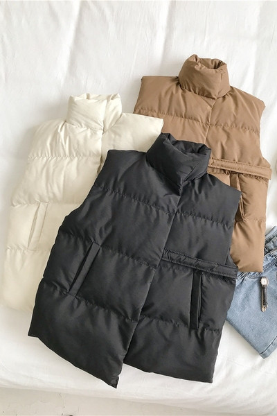 Naiste moodne kolmevärviline taskutega vest