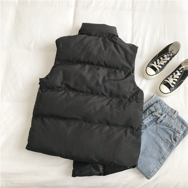 Naiste moodne kolmevärviline taskutega vest