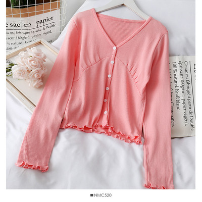 Naiste vabaaja nööpide ja lokkidega kardigan