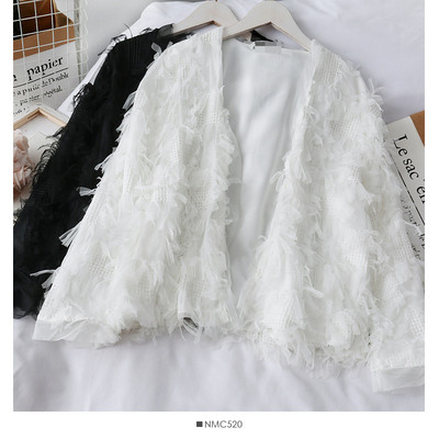 Moodne naiste vest tülli elementidega - ilma kinnituseta