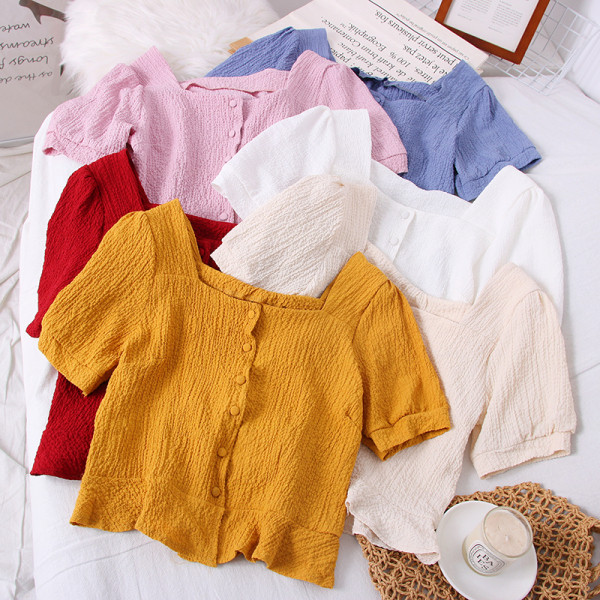 Kandilise kaelusega ja lühikeste varrukatega naiste särk – uus mudel