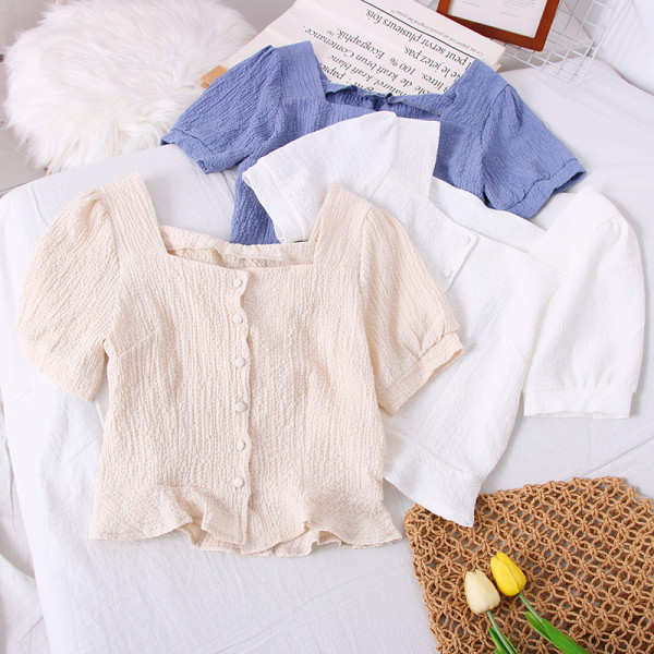 Kandilise kaelusega ja lühikeste varrukatega naiste särk – uus mudel