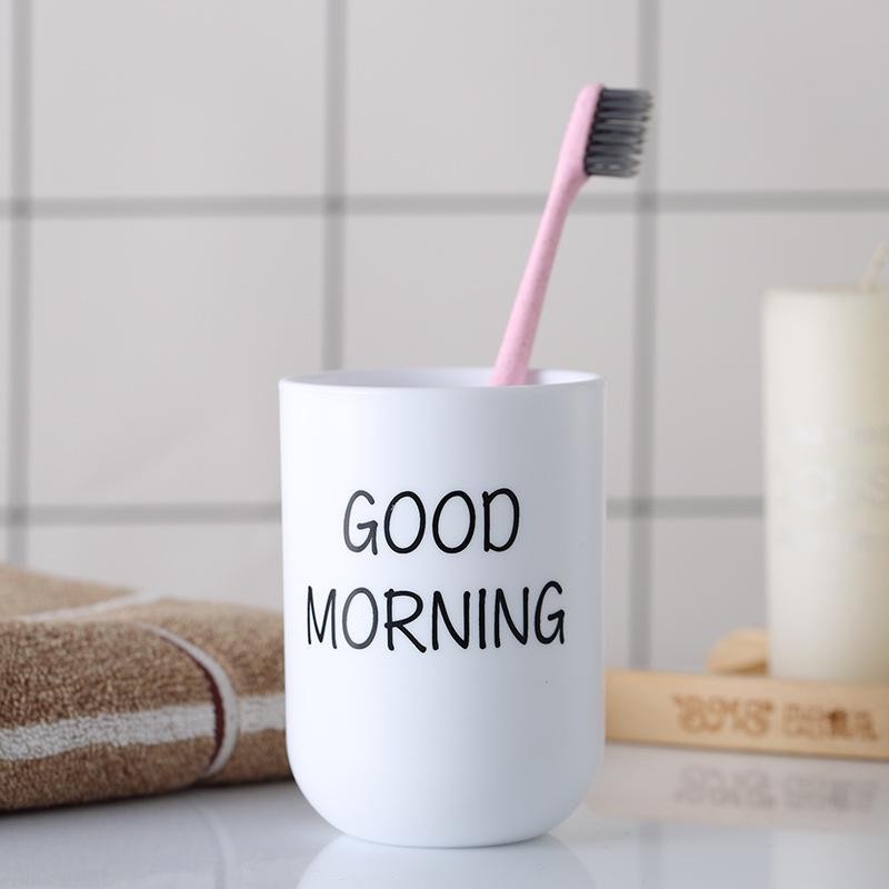 Plastic cup with inscription for toothbrushes