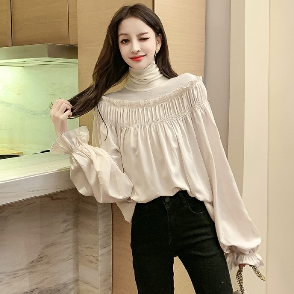 Laiade varrukate ja kõrge kraega kevadine naiste särk