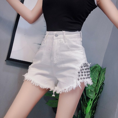 Uus kõrge vöökoha ja metallist neetidega teksapükste mudel