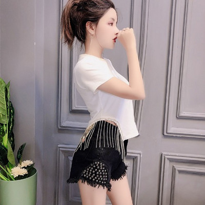 Uus kõrge vöökoha ja metallist neetidega teksapükste mudel