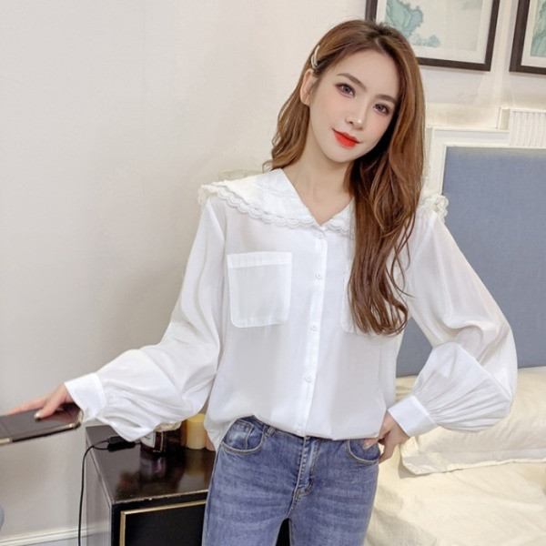 Valge naiste särk puhvis varrukate ja taskutega