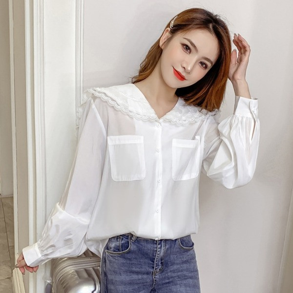 Valge naiste särk puhvis varrukate ja taskutega