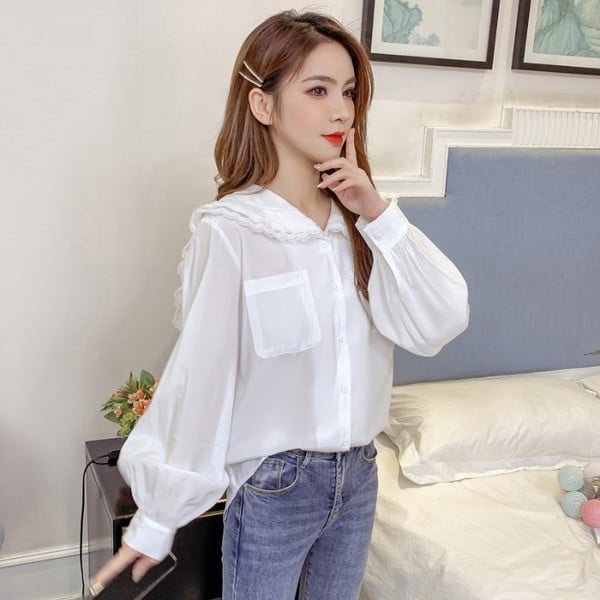 Valge naiste särk puhvis varrukate ja taskutega