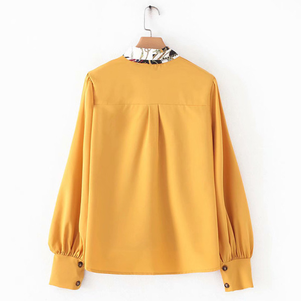 Új modell női tavaszi ing szalaggal a nyakkivágáson, színes mintával