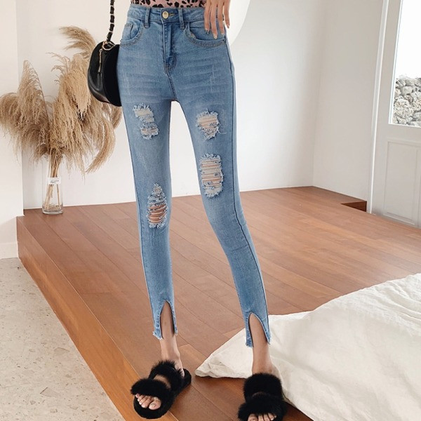 Modern női farmer Karcsú modell magas derékkal, szakadt motívumokkal