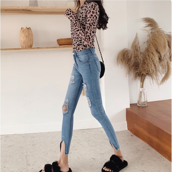 Modern női farmer Karcsú modell magas derékkal, szakadt motívumokkal