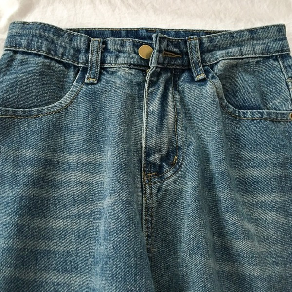 Retro stiilis kõrge vöökoha ja taskutega naiste teksad