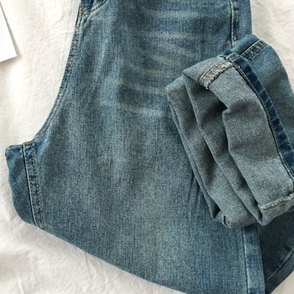 Retro stiilis kõrge vöökoha ja taskutega naiste teksad