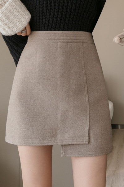 Asümmeetriline kõrge vöökohaga naiste seelik