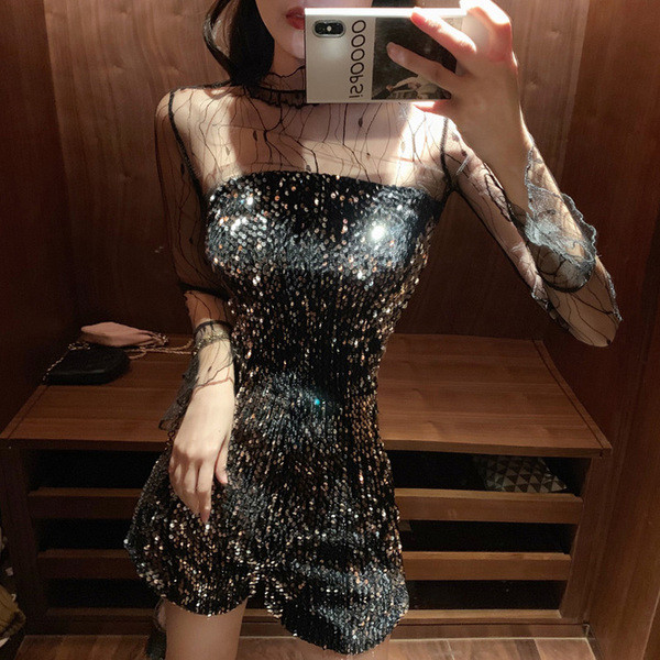 Stílusos női overál hosszú ujjal és flitterekkel