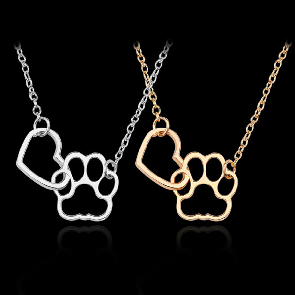 Moteriškas karoliai su pakabučiais – letenėlė su širdele