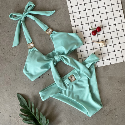 Uus kaheosaline lipsude ja kividega ujumistrikoo