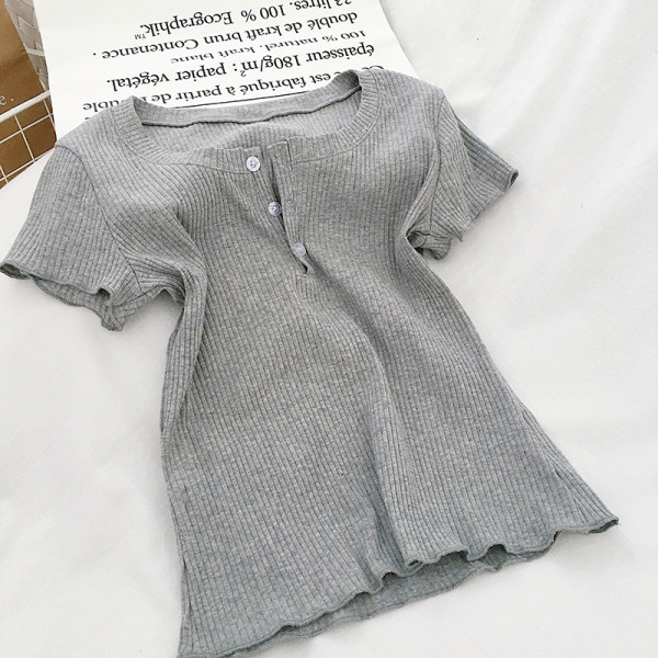 Női blúz széles modell négy színben gombokkal