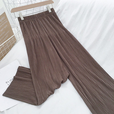 Naiste moodsad kolmes värvitoonis plisseeritud püksid