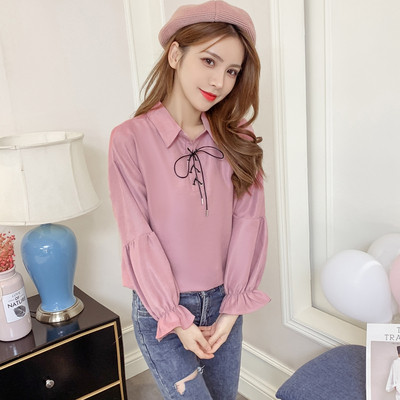 Moodne naiste särk klassikalise krae, paelte ja pikkade varrukatega