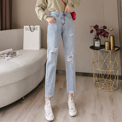 Rebenenud motiivide ja kõrge vöökohaga vabaaja naiste teksad