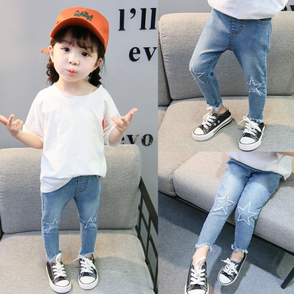 Moodsad laste teksad tüdrukutele tikandite ja taskutega