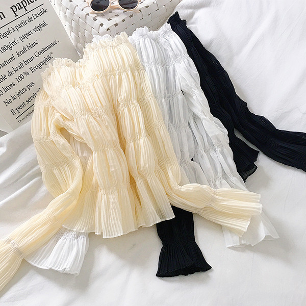 Naiste aktuaalne pluusiga liibuv mudel kolmes värvitoonis