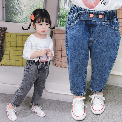 Moodsad nööpide ja kõrge vöökohaga lasteteksad tüdrukutele