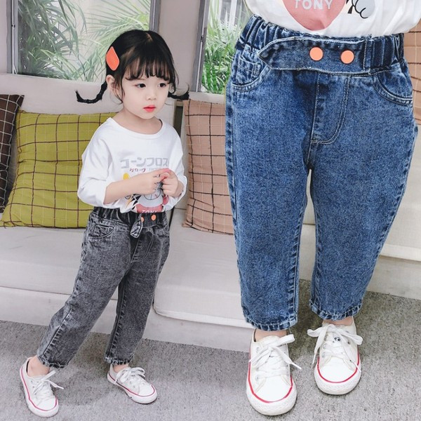 Moodsad nööpide ja kõrge vöökohaga lasteteksad tüdrukutele