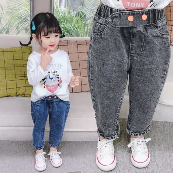 Moodsad nööpide ja kõrge vöökohaga lasteteksad tüdrukutele