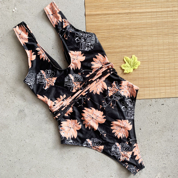 Täielik väljalõigetega, lillemustriga ja lipsudega ujumistrikoo