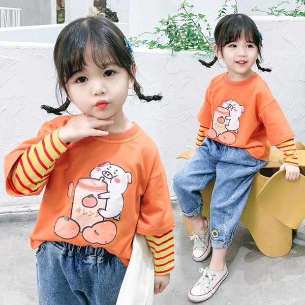 Laisva vaikiška palaidinė su aplikacijomis ir apvalia iškirpte mergaitėms