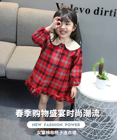 Kockás gyerekruha gombokkal és hosszú ujjal