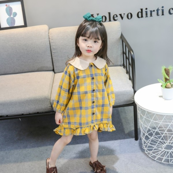 Kockás gyerekruha gombokkal és hosszú ujjal