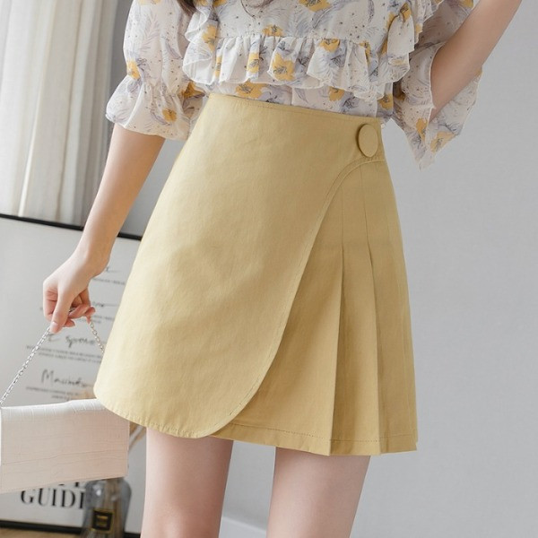 Tavaszi női szoknya magas derékkal, ráncokkal és gombbal