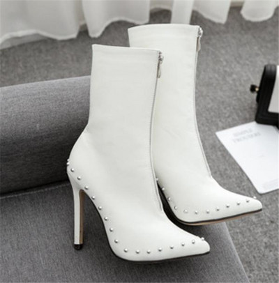 Moodsad kunstnahast õhukese kontsa ja lukuga naiste saapad - terava otsaga mudel