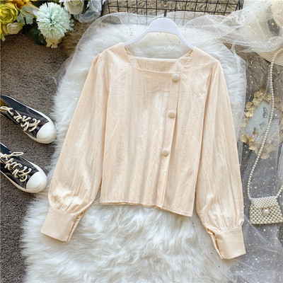 Naiste särk pikkade varrukatega, kandilise kaelusega ja nööpidega