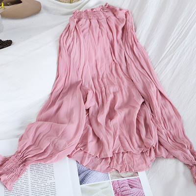 Naiste plisseeritud särk, mille krae ja varrukad on kummiga