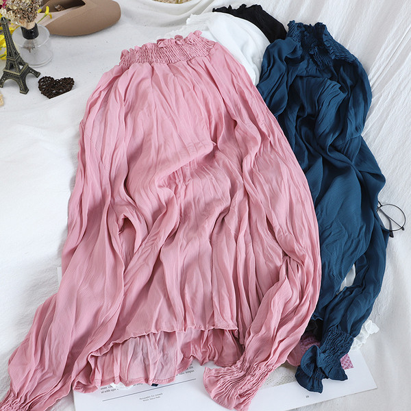 Naiste plisseeritud särk, mille krae ja varrukad on kummiga