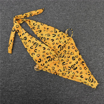 Täielik ujumistrikoo sügava dekoltee, leopardimustri ja lipsudega