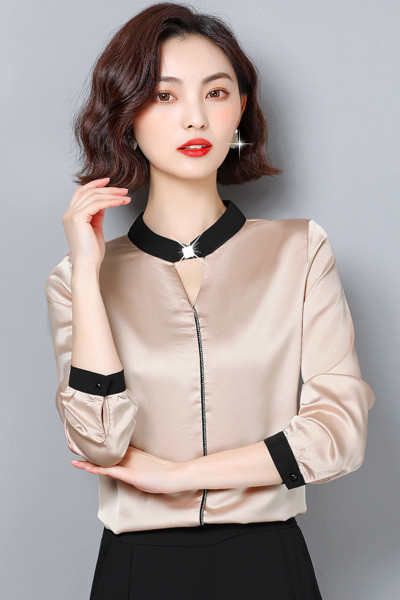 Naiste madala krae ja pikkade varrukatega siidist särk