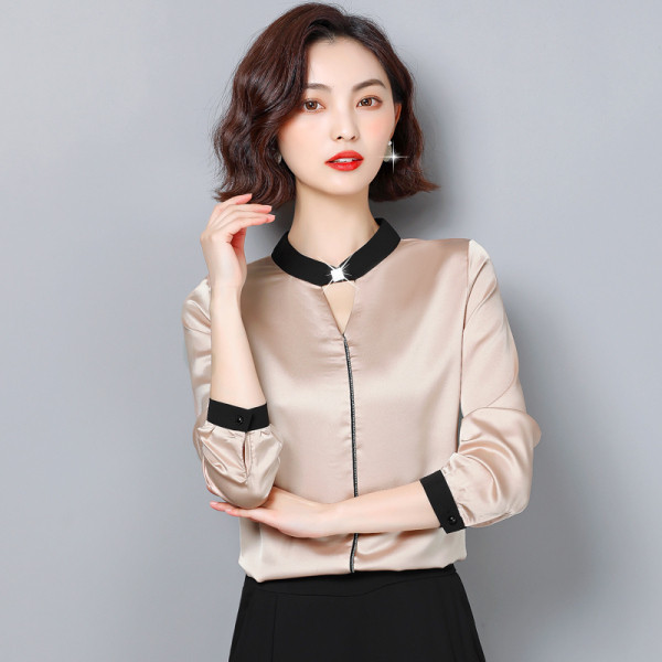 Naiste madala krae ja pikkade varrukatega siidist särk