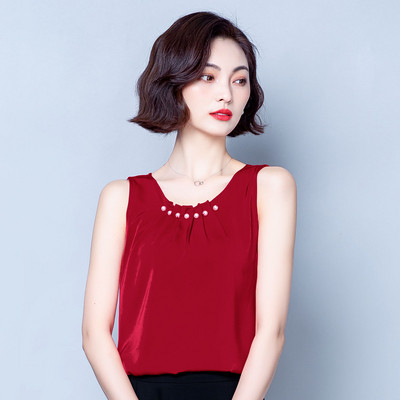 Moodne ümara dekoltee ja pärlitega naiste topp