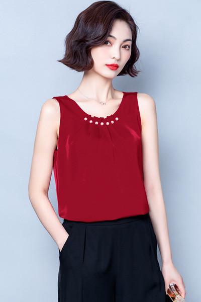 Moodne ümara dekoltee ja pärlitega naiste topp